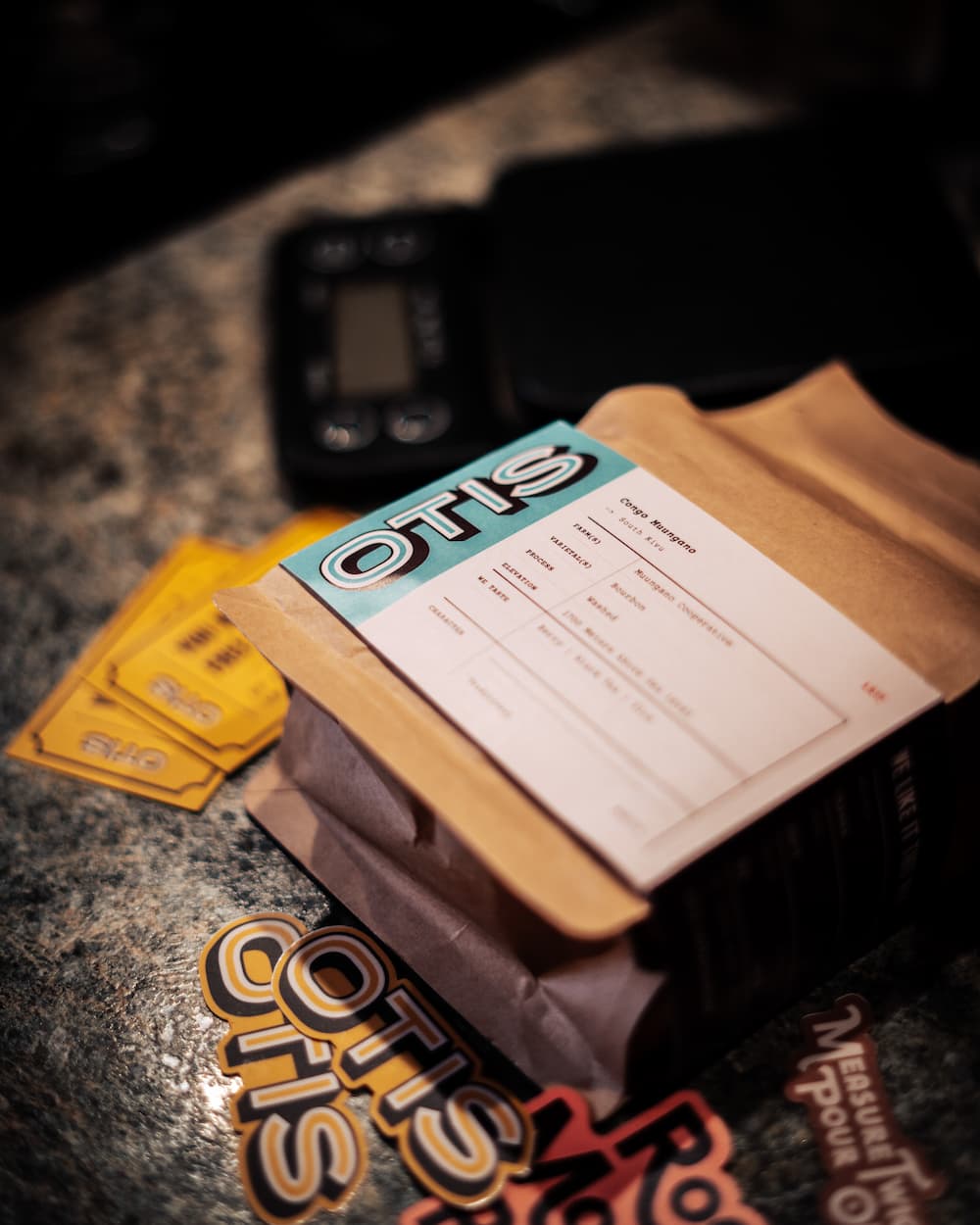 Specialty coffee from OTIS along with free drink cards and stickers